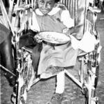 An orphan girl in Kenya with polio.