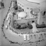 Aerial view of a crowd in San Antonio, 1962, awaiting polio immunization.