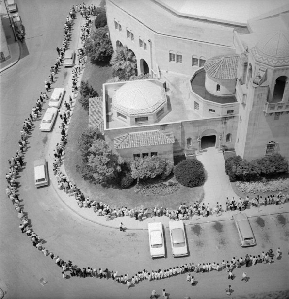 Aerial view of a crowd in San Antonio, 1962, awaiting polio immunization.