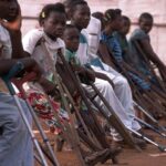 Children with polio, most with crutches, in Freetown, Sierra Leone.